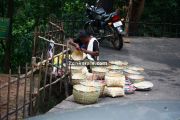 Woman making bamboo items