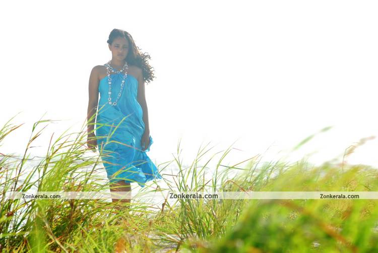 Nithya Menon Beach Photos 12