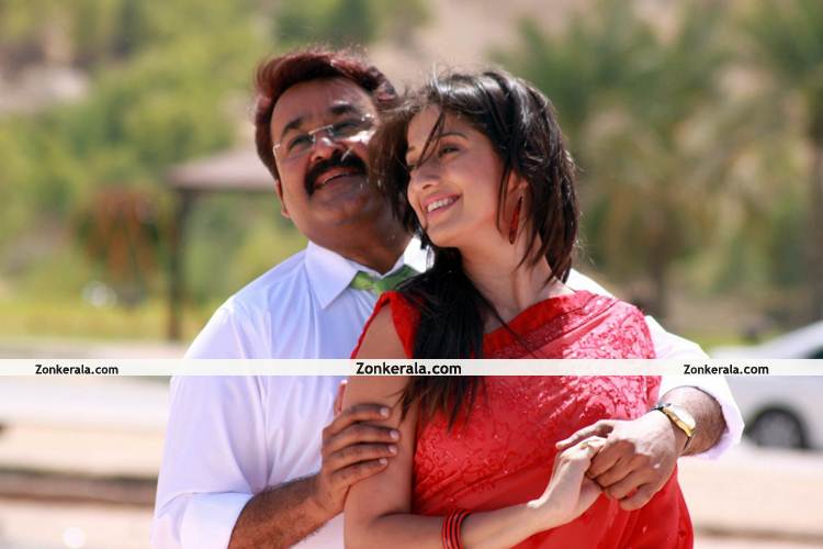 Mohanlal And Lakshmi Rai In Arabiyum Ottakavum 2