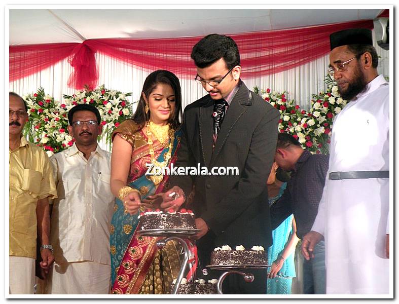 Karthika Merin Cutting Cake At Reception 1